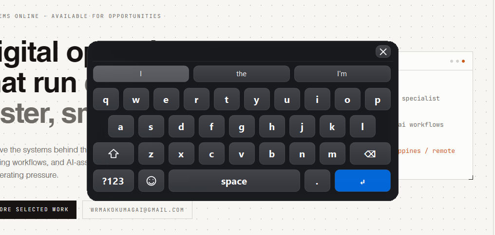 HandsFree panel floating over a webpage with a prediction bar, letter tiles, emoji key, and blue enter key